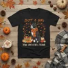 Black t-shirt with "JUST A GIRL WHO LOVES FALL & PITBULL" text, featuring a pitbull wearing a scarf surrounded by