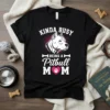 Black t-shirt with "KINDA BUSY BEING A Pitbull MOM" text, featuring a white pitbull head graphic and pink heart with