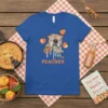 Miss Peaches t-shirt design featuring a pitbull wearing glasses and surrounded by peaches, with the text "Miss Peaches" below