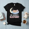 My Favorite Sleepshirt text with a sleeping bulldog graphic on a black t-shirt, featuring a moon and stars
