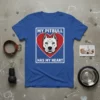 My Pitbull Has My Heart t-shirt design with a pitbull face inside a red heart graphic