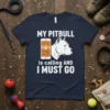 My Pitbull is Calling And I Must Go t-shirt with white text and pitbull graphic on navy shirt
