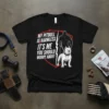 Black t-shirt with bold white text "MY PITBULL IS HARMLESS IT'S ME YOU SHOULD WORRY ABOUT" and graphic of a