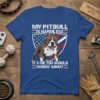 Pitbull dog with American flag shield graphic and text "My Pitbull Is Harmless It's Me You Should Worry About" on