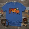 Peace Love Dog t-shirt design featuring a peace sign, a heart with a tree, and a dog on a pumpkin