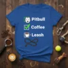 Pitbull Coffee Leash checklist design on a blue t-shirt, featuring a pitbull graphic, coffee cup icon, and leash illustration