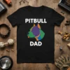 Black t-shirt with "PITBULL DAD" text and a colorful pit bull head graphic, perfect for dog dads