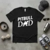 Black t-shirt with white "Pitbull Dad" text and a silhouette of a pitbull dog