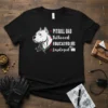 Pitbull Dad Tattooed Educated Employed text with pitbull head graphic, tattoo gun, books, and briefcase on black t-shirt