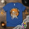 Skelton Rider Pitbull Mummy Halloween t-shirt design featuring a skeleton riding a mummified pitbull with a pumpkin candy bucket