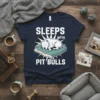 Sleeps With Pit Bulls t-shirt design featuring a sleeping white pit bull on a pillow with bold white text