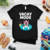 Black t-shirt with "VACAY MODE" text and a cartoon pitbull dog wearing sunglasses in a blue inner tube