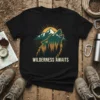 Black t-shirt with "Wilderness Awaits" text, featuring a graphic of a wolf howling at mountains and sun