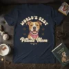 World's BEST Pitbull Mom t-shirt design with a smiling Pitbull wearing a pink bandana and paw prints